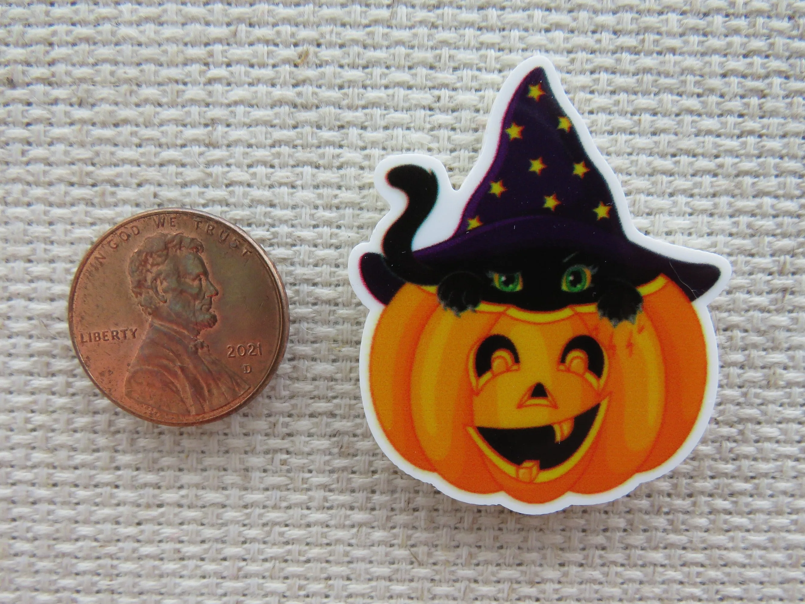 Little Black Cat Peeking out of A Happy Jack O Lantern Needle Minder, Cover Minder, Magnet